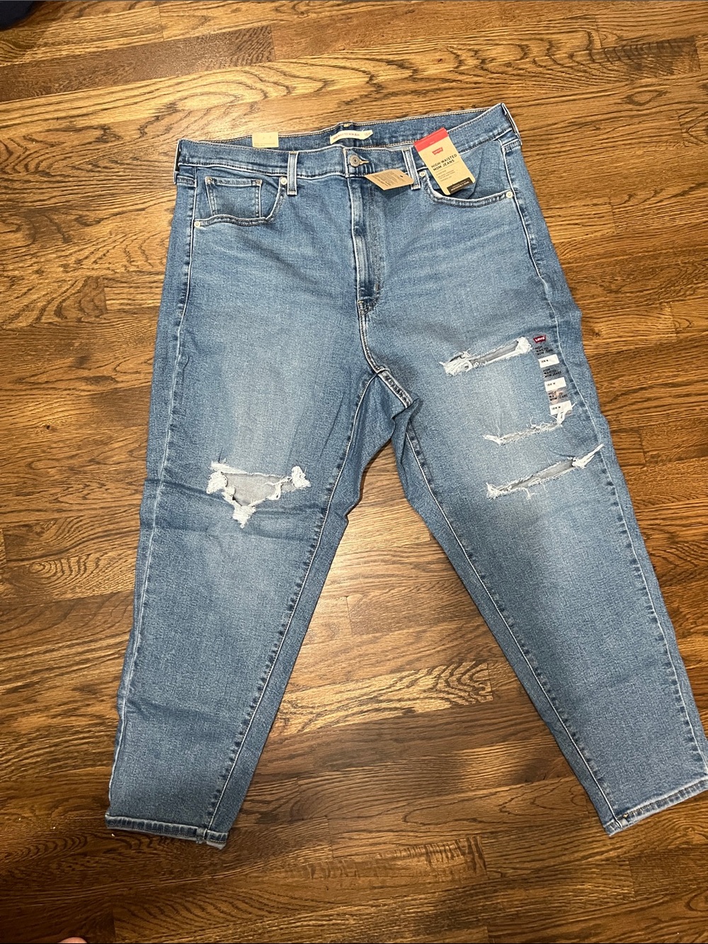 Levi's Women’s Light Blue Slim Straight Jeans with Distressed Details